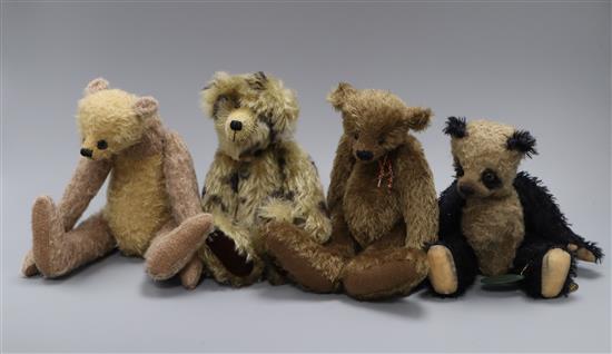 Four assorted bears
